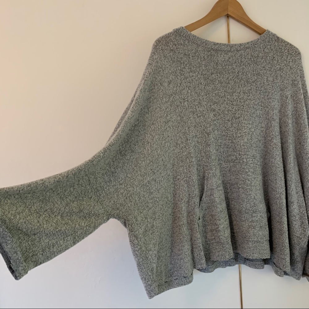 Grey and white striped poncho (w/ sleeves)